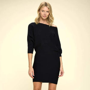 Black ribbed off-the-shoulder mini sweater dress with dolman, 3/4 inch sleeves and a straight hemline, perfect for chic casual wear, girls night out or date night.