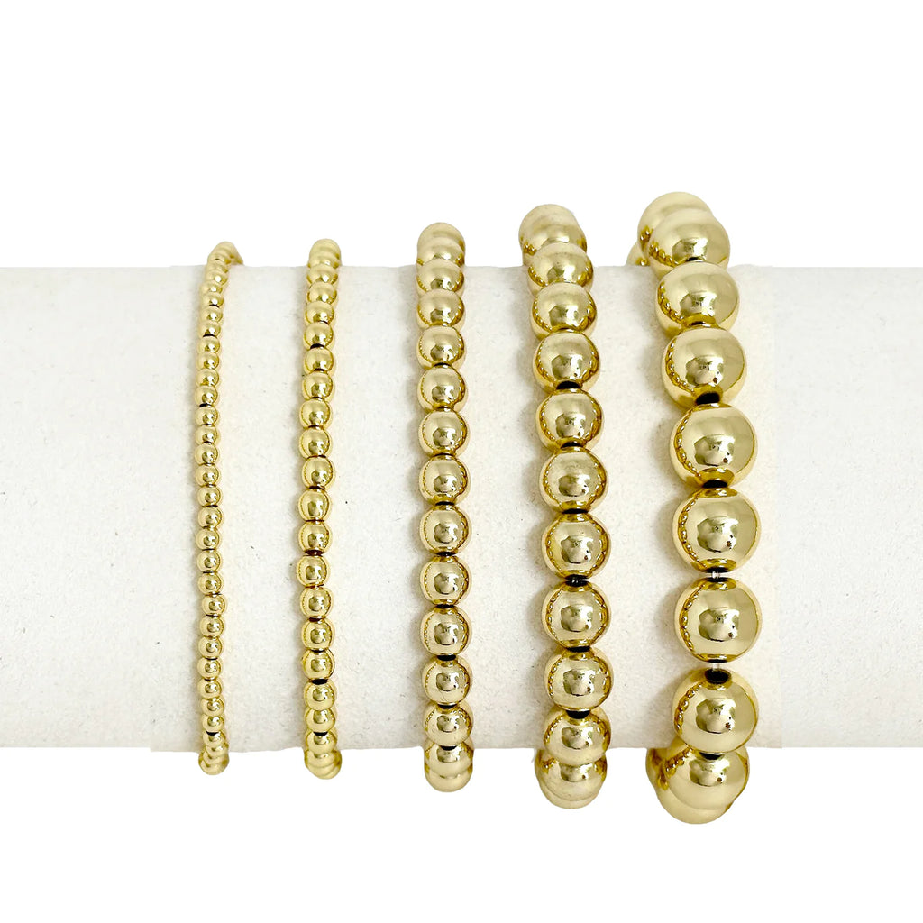 Celebrity 5 Stack of Gold Beaded Bracelets